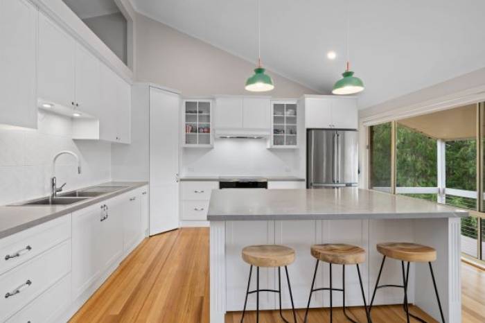 Bright White Traditional Kitchen With Island